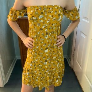 Off the shoulder yellow floral dress.